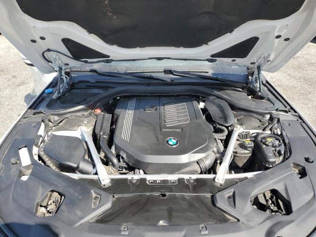 WBAGV4C01PCL65666 - 2023 BMW 840XI WHITE photo 11