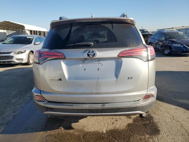 2T3ZFREV1HW359881 - 2017 TOYOTA RAV4 LE SILVER photo 6