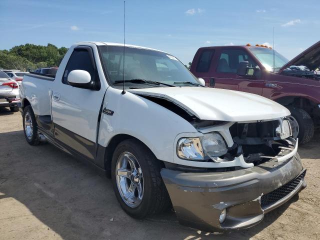 2FTZF0737YCA81699 - 2000 FORD F150 SVT LIGHTNING WHITE photo 4