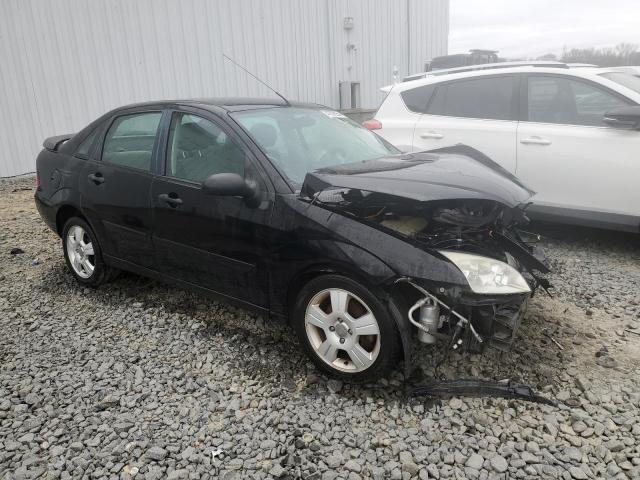 1FAHP34N86W245551 - 2006 FORD FOCUS ZX4 BLACK photo 4