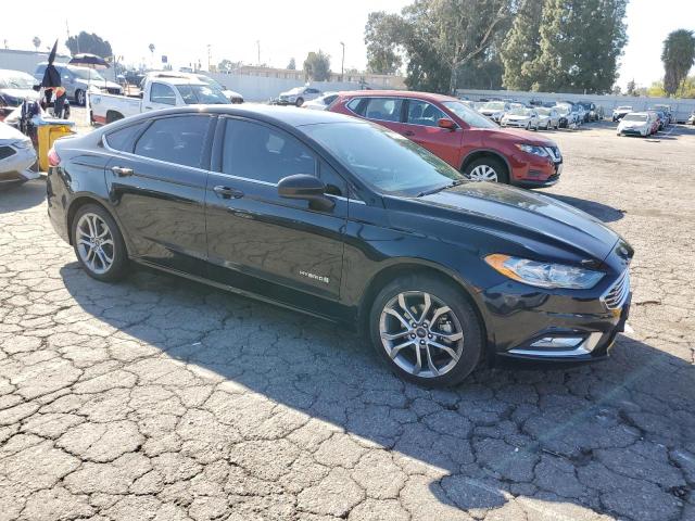 3FA6P0LU1HR324807 - 2017 FORD FUSION SE HYBRID BLACK photo 4