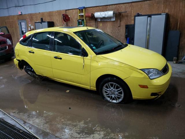 3FAFP37N35R123751 - 2005 FORD FOCUS ZX5 YELLOW photo 4