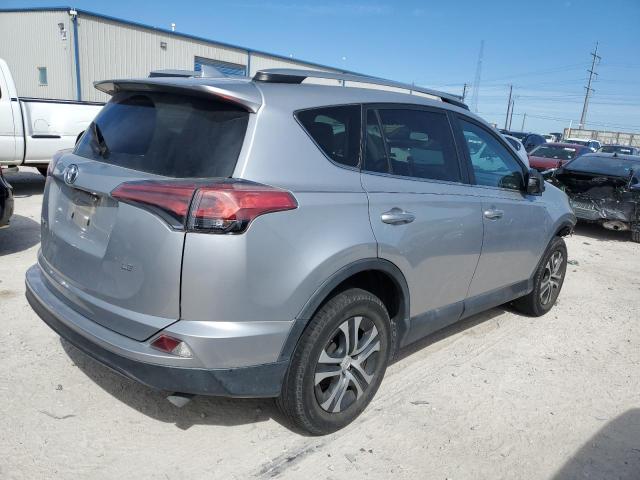 2T3ZFREV4HW358577 - 2017 TOYOTA RAV4 LE SILVER photo 3