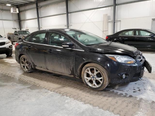 1FAHP3J28CL467725 - 2012 FORD FOCUS TITANIUM BLACK photo 4