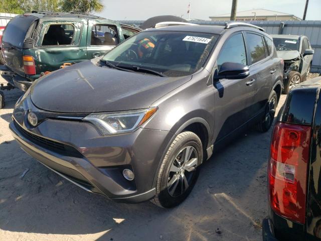 2T3WFREV1HW379499 - 2017 TOYOTA RAV4 XLE GRAY photo 1