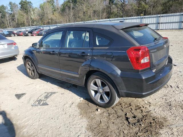 1B3CB3HA4BD110648 - 2011 DODGE CALIBER MAINSTREET BLACK photo 2