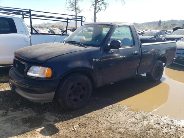 1FTZF17231NB18910 - 2001 FORD F150 BLACK photo 1