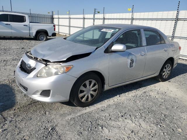 JTDBL40E199090304 - 2009 TOYOTA COROLLA BASE SILVER photo 1