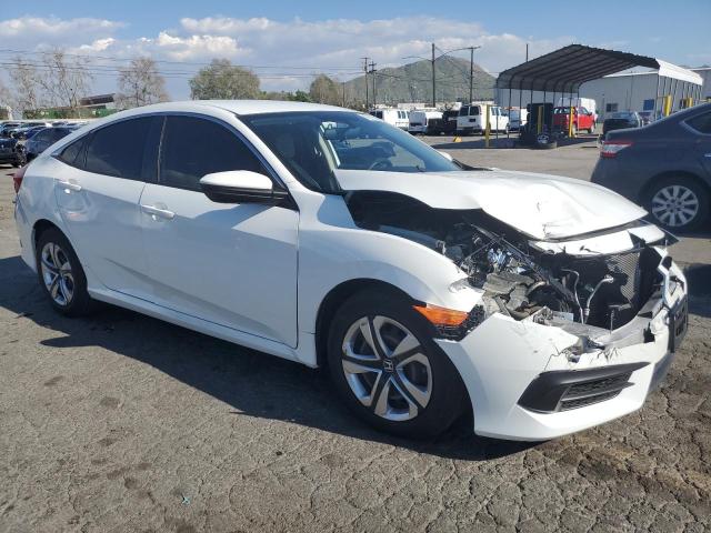 2HGFC2F57GH560511 - 2016 HONDA CIVIC LX WHITE photo 4