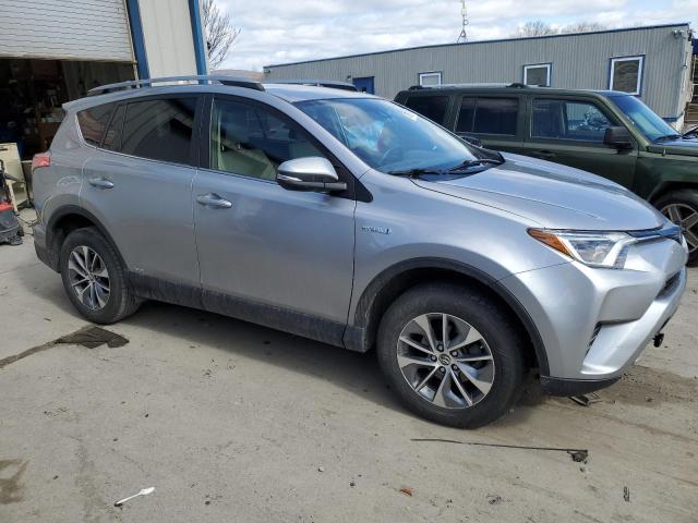 JTMRJREV7JD186322 - 2018 TOYOTA RAV4 HV LE SILVER photo 4