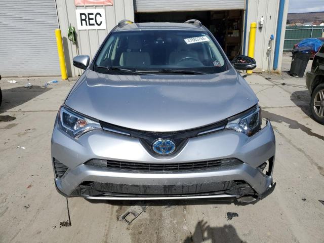 JTMRJREV7JD186322 - 2018 TOYOTA RAV4 HV LE SILVER photo 5