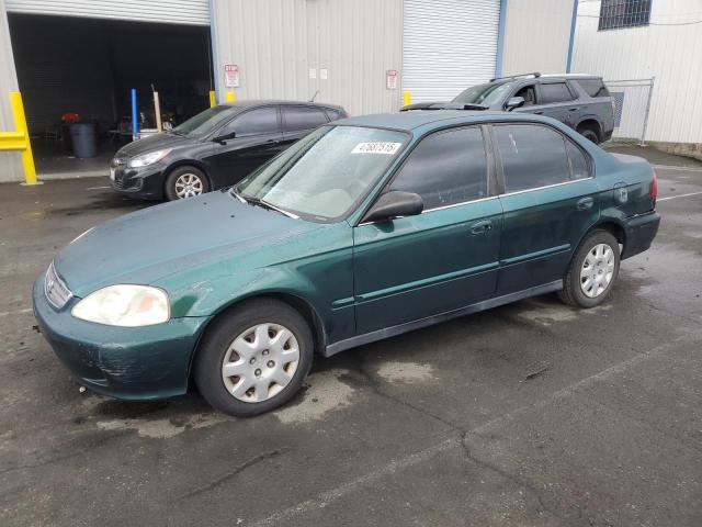 2HGEJ6610XH579794 - 1999 HONDA CIVIC BASE GREEN photo 1