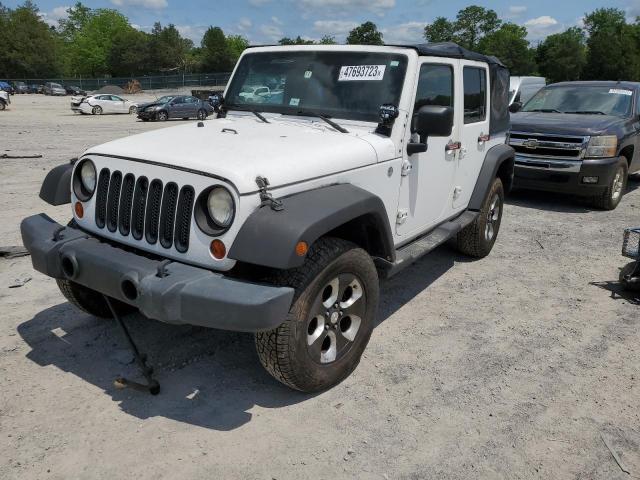 1J4BA5H13BL532659 - 2011 JEEP WRANGLER U SAHARA WHITE photo 1
