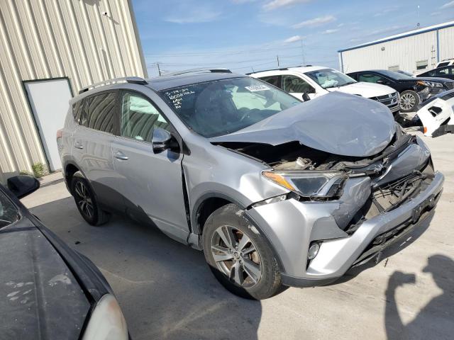 2T3WFREV6GW253525 - 2016 TOYOTA RAV4 XLE SILVER photo 4