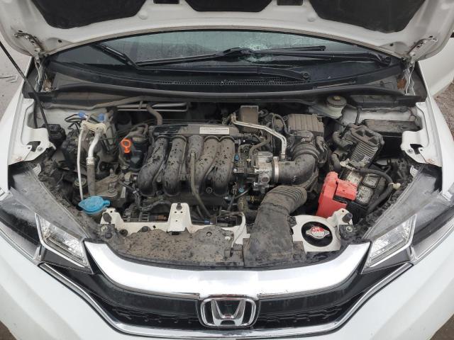 3HGGK5H40JM735266 - 2018 HONDA FIT LX WHITE photo 11