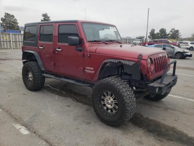 1C4BJWDG2CL139324 - 2012 JEEP WRANGLER U SPORT BURGUNDY photo 4