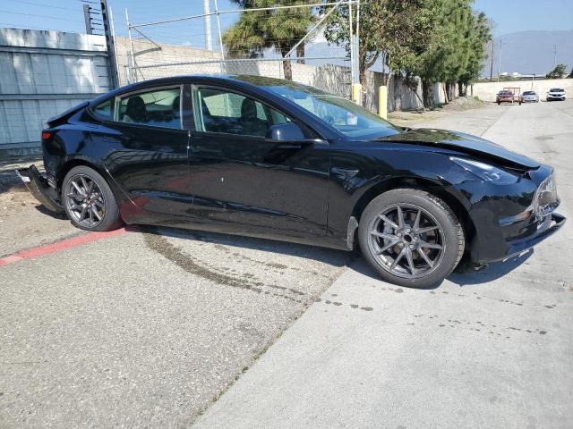 5YJ3E1EAXPF457853 - 2023 TESLA MODEL 3 BLACK photo 4