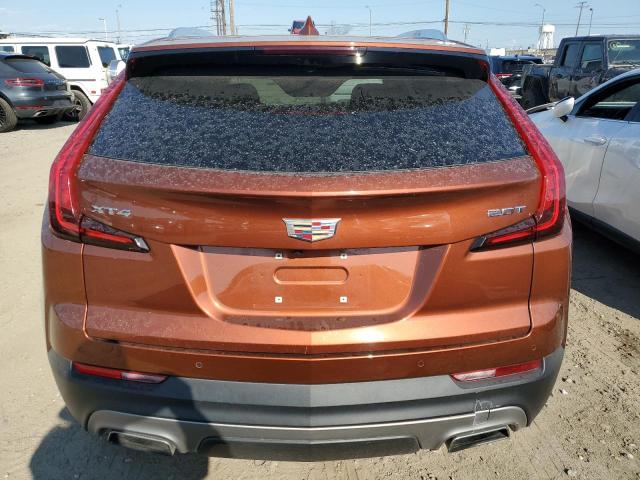 1GYFZCR48KF174514 - 2019 CADILLAC XT4 PREMIUM LUXURY ORANGE photo 6