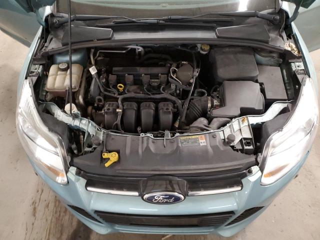 1FAHP3M24CL358397 - 2012 FORD FOCUS SEL TURQUOISE photo 11