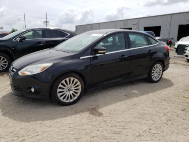 1FAHP3J26CL377960 - 2012 FORD FOCUS TITANIUM BLACK photo 1