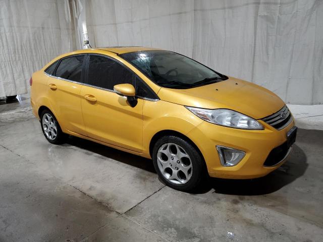 3FADP4CJXBM214329 - 2011 FORD FIESTA SEL YELLOW photo 4