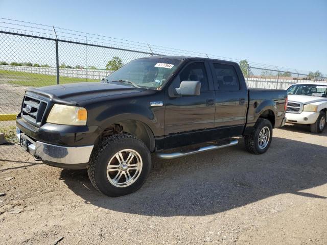 1FTPW14565KE37540 - 2005 FORD F150 SUPERCREW BLACK photo 1