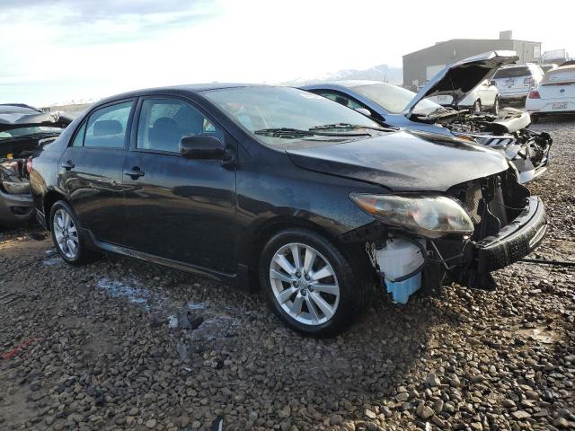 1NXBU4EE1AZ249941 - 2010 TOYOTA COROLLA BASE BLACK photo 4