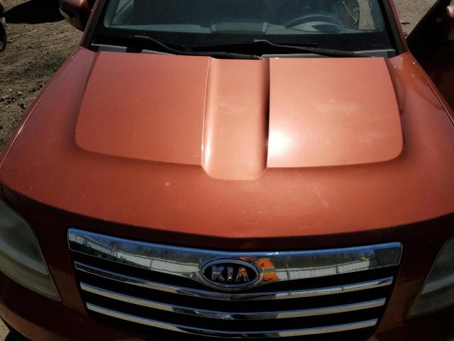 KNDJH741395025029 - 2009 KIA BORREGO LX ORANGE photo 11