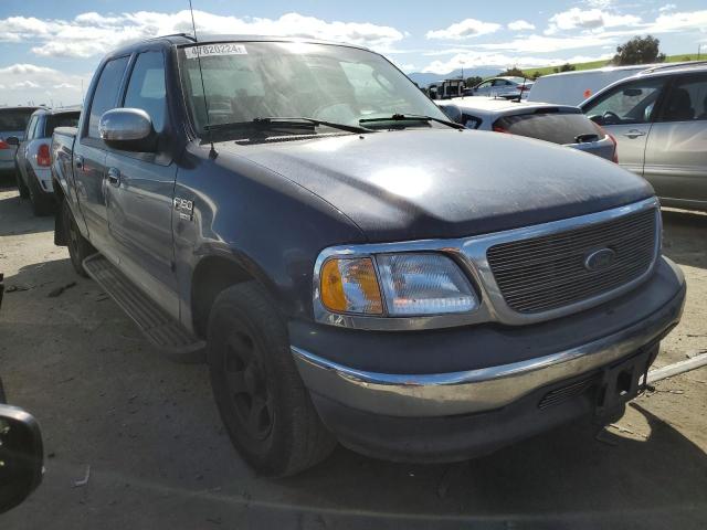 1FTRW07662KC87495 - 2002 FORD F150 SUPERCREW BLUE photo 4