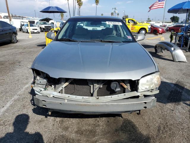 3N1CB51D74L910763 - 2004 NISSAN SENTRA 1.8 TAN photo 5