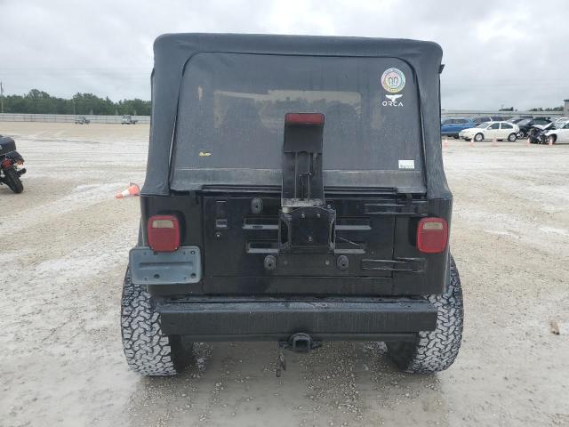 1J4FY49S9VP529955 - 1997 JEEP WRANGLER / SAHARA BLACK photo 6