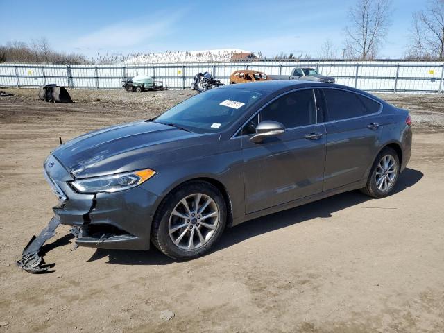 3FA6P0HD1HR186081 - 2017 FORD FUSION SE GRAY photo 1