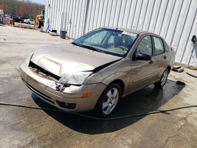 1FAFP34N05W182905 - 2005 FORD FOCUS ZX4 GOLD photo 1