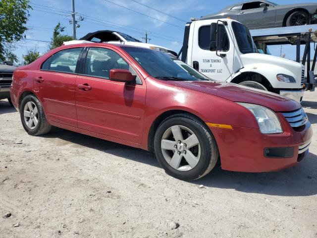 3FAFP07Z06R214754 - 2006 FORD FUSION SE RED photo 4