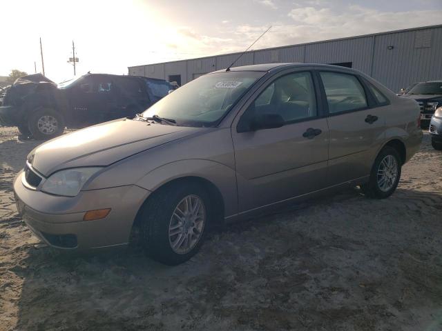 1FAFP34N95W271615 - 2005 FORD FOCUS ZX4 TAN photo 1