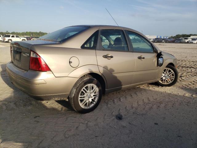 1FAFP34N95W271615 - 2005 FORD FOCUS ZX4 TAN photo 3