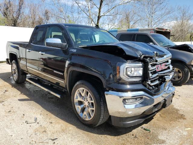 1GTV2NEC7HZ310878 - 2017 GMC SIERRA K1500 SLT BLACK photo 4