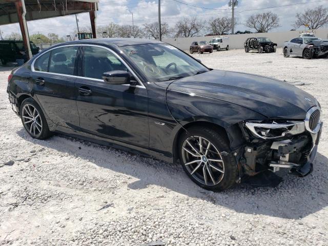 3MW5P9J06N8C65584 - 2022 BMW 330XE BLACK photo 4