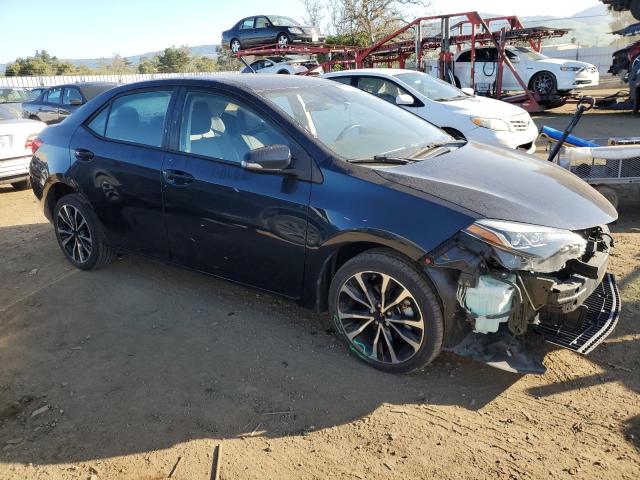 5YFBURHEXHP686194 - 2017 TOYOTA COROLLA L BLUE photo 4