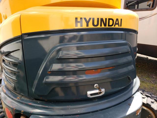 HHKHMH04VJ0000588 - 2018 HYUNDAI EXCAVATOR ORANGE photo 7