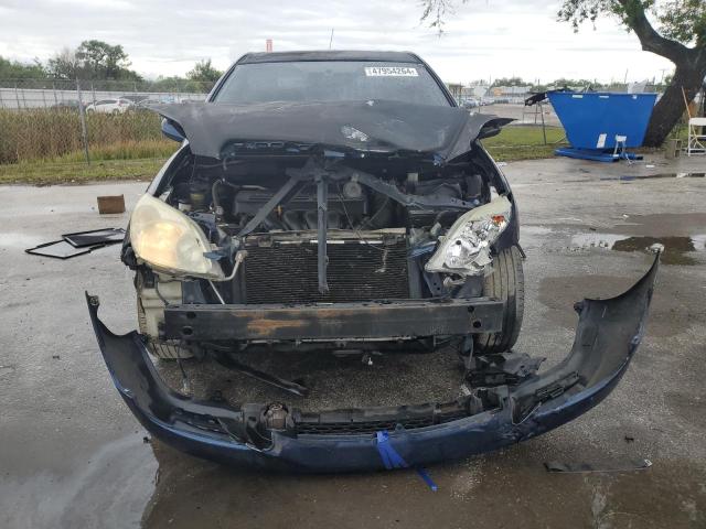 2T1KR32E94C223576 - 2004 TOYOTA COROLLA MA XR BLUE photo 5