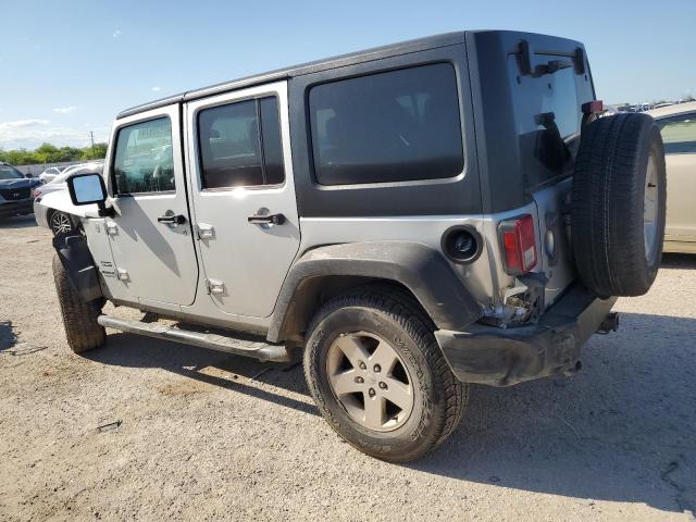 1J4HA3H12BL570687 - 2011 JEEP WRANGLER U SPORT SILVER photo 2