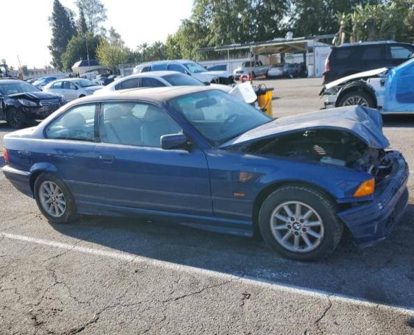 WBABG2338XET38424 - 1999 BMW 328 IS AUTOMATIC BLUE photo 4