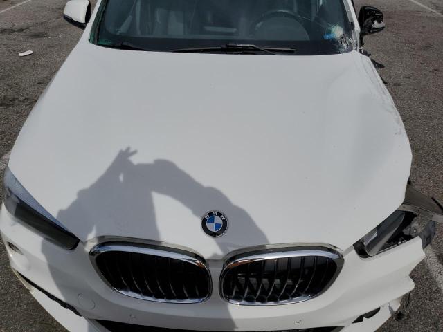 WBXHU7C35H5H36409 - 2017 BMW X1 SDRIVE28I WHITE photo 12