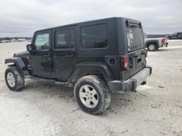 1J4BA5H13AL210747 - 2010 JEEP WRANGLER U SAHARA Qara foto 2