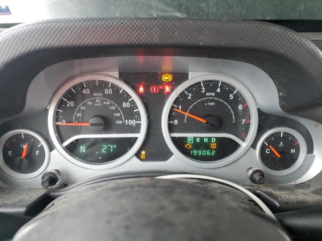 1J4BA5H13AL210747 - 2010 JEEP WRANGLER U SAHARA Qara foto 9