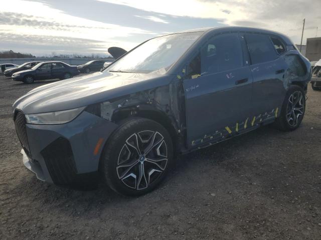 WB523CF04RCN04874 - 2024 BMW IX XDRIVE50 GRAY photo 1
