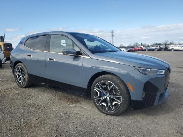 WB523CF04RCN04874 - 2024 BMW IX XDRIVE50 GRAY photo 4
