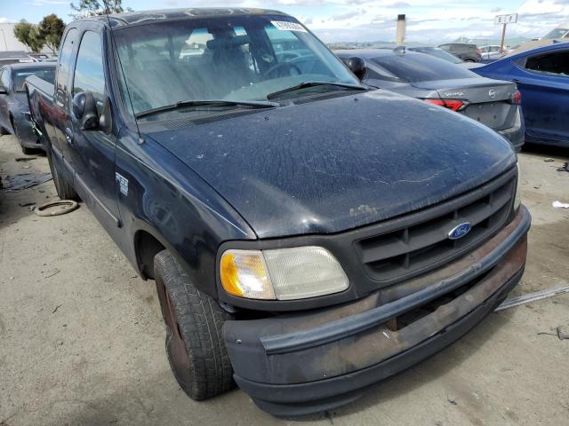 1FTZX1760WKC38740 - 1998 FORD F150 BLACK photo 4