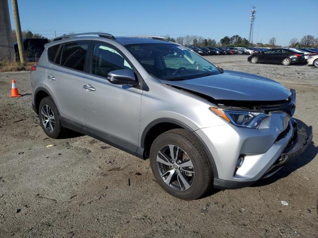 2T3WFREV2HW374232 - 2017 TOYOTA RAV4 XLE SILVER photo 4